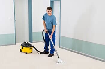 Man Cleaning the Floor — Janitorial Services in Winooski, VT