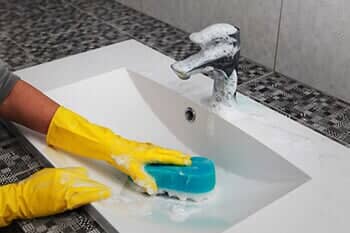 Cleaning the Sink — Janitorial Services in Winooski, VT