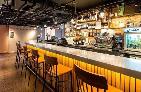 Tricycle Theatre fit-out dining area bespoke furniture 1