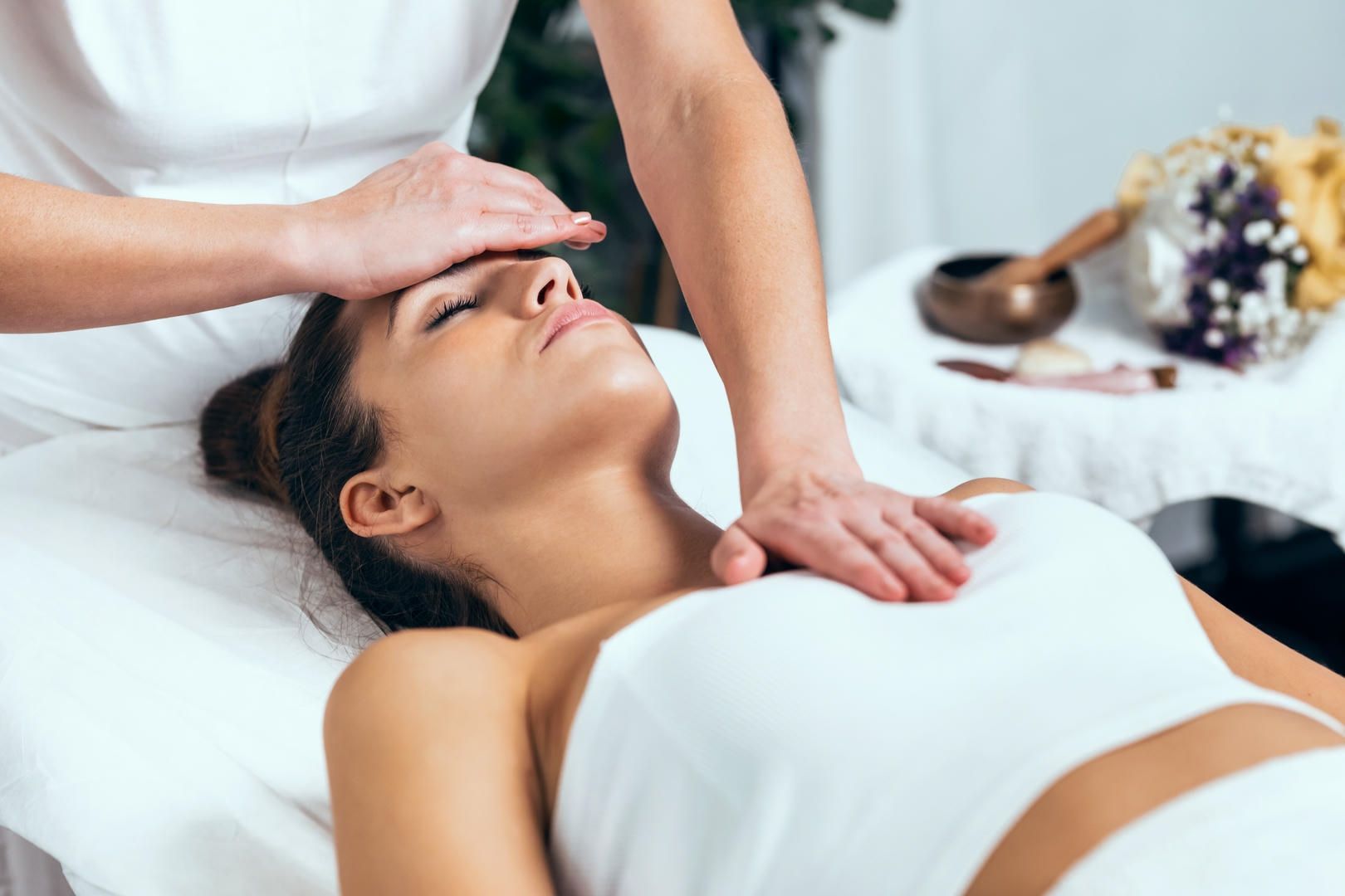 A woman is getting a massage at a spa.