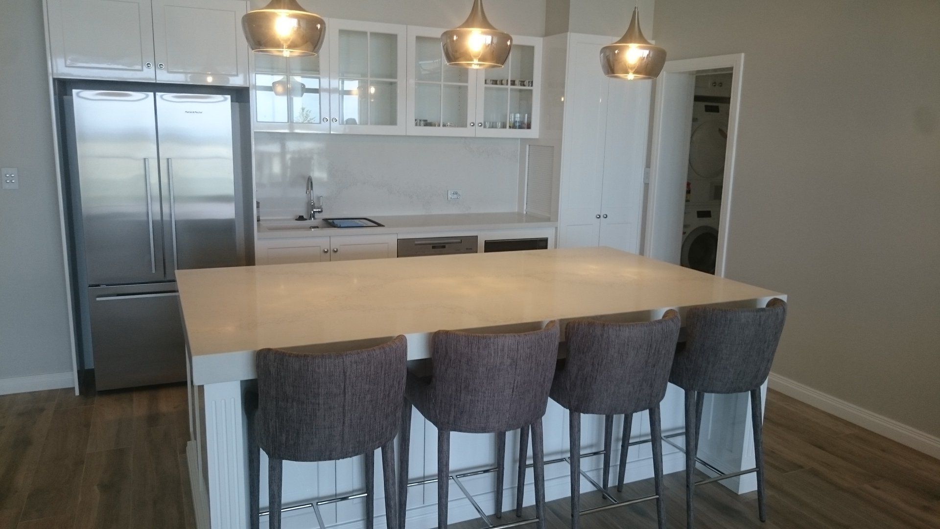 Modern Kitchen With White Cabinets, Stainless Steel Refrigerator — Payton Kitchens in Warwick, QLD