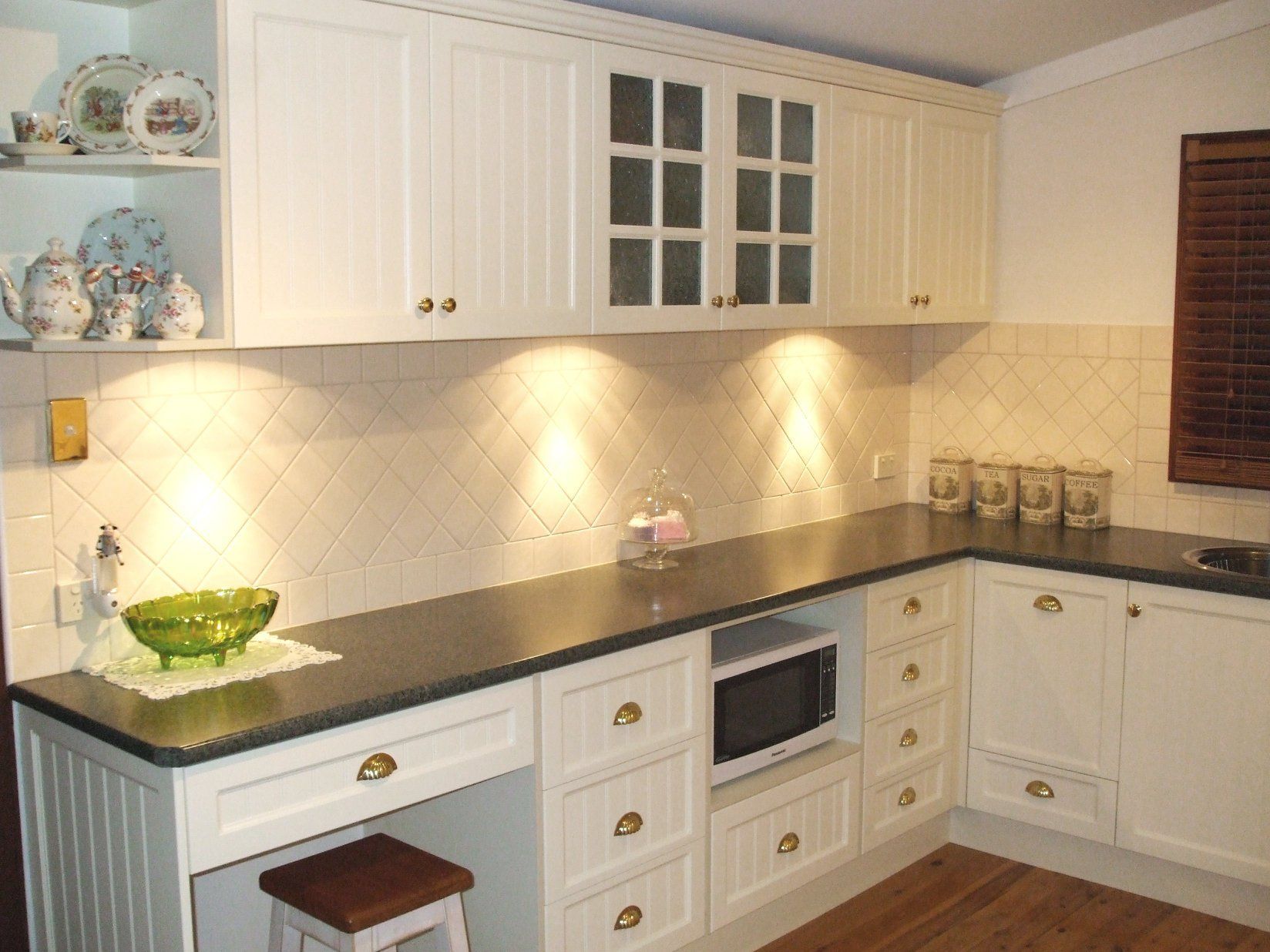 Wooden Desk and Cabinets in a Room, With Built-in Lighting  — Payton Kitchens In Wilsonton, QLD