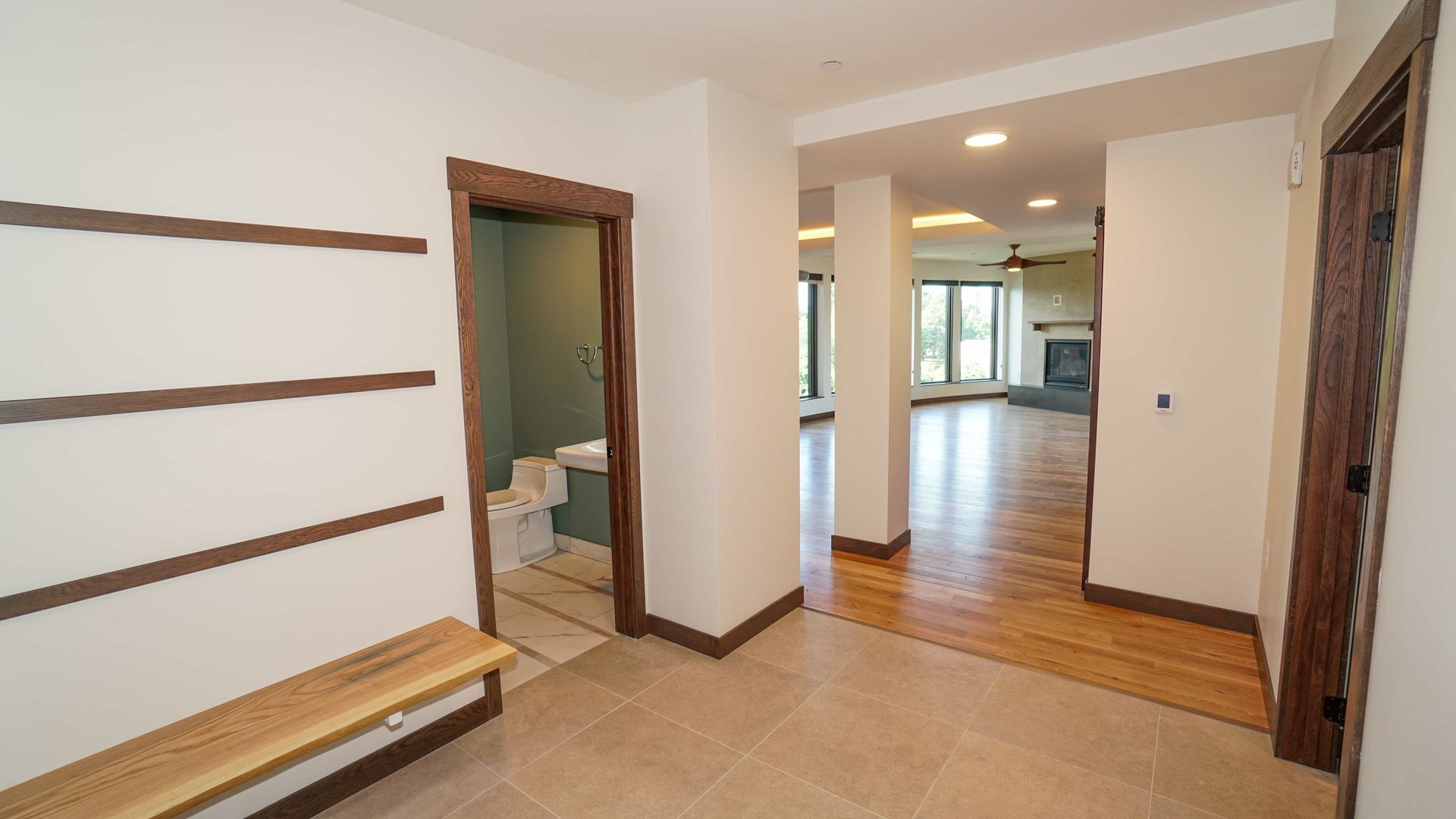 There is a bench in the middle of the room.