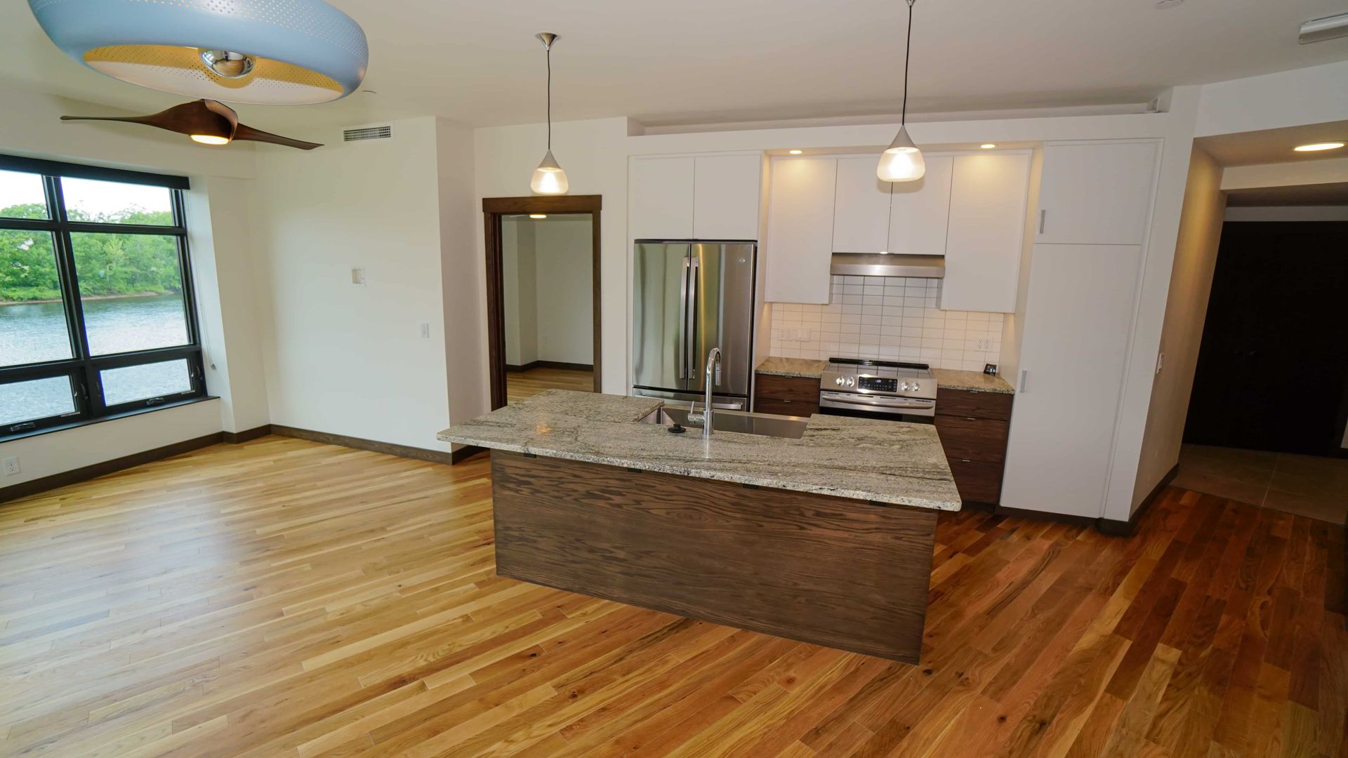 There is a large island in the middle of the kitchen.