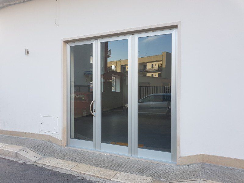 Porta finestra a tre ante