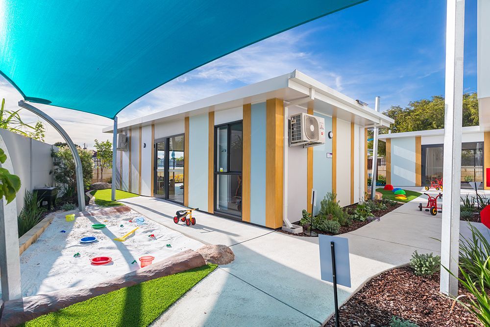 Thornlie Early Learning Centre outside beside sand pit under shade cloth