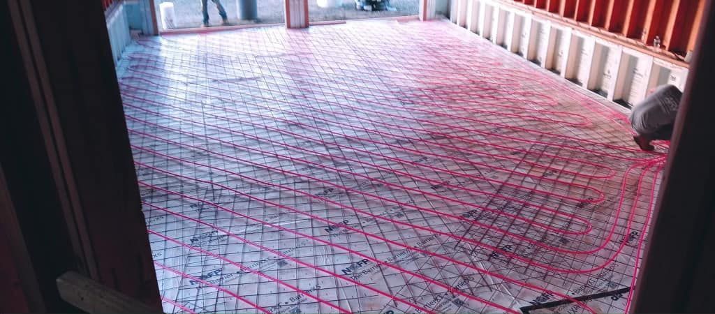 A room with a lot of red lines on the floor.