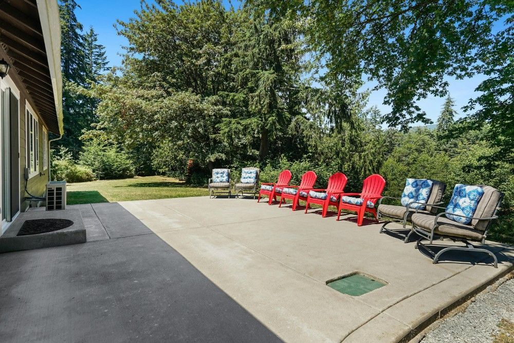 Concrete patio with chairs outside in St. Louis, MO