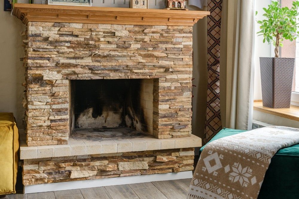 Indoor stone fireplace in St. Louis, MO