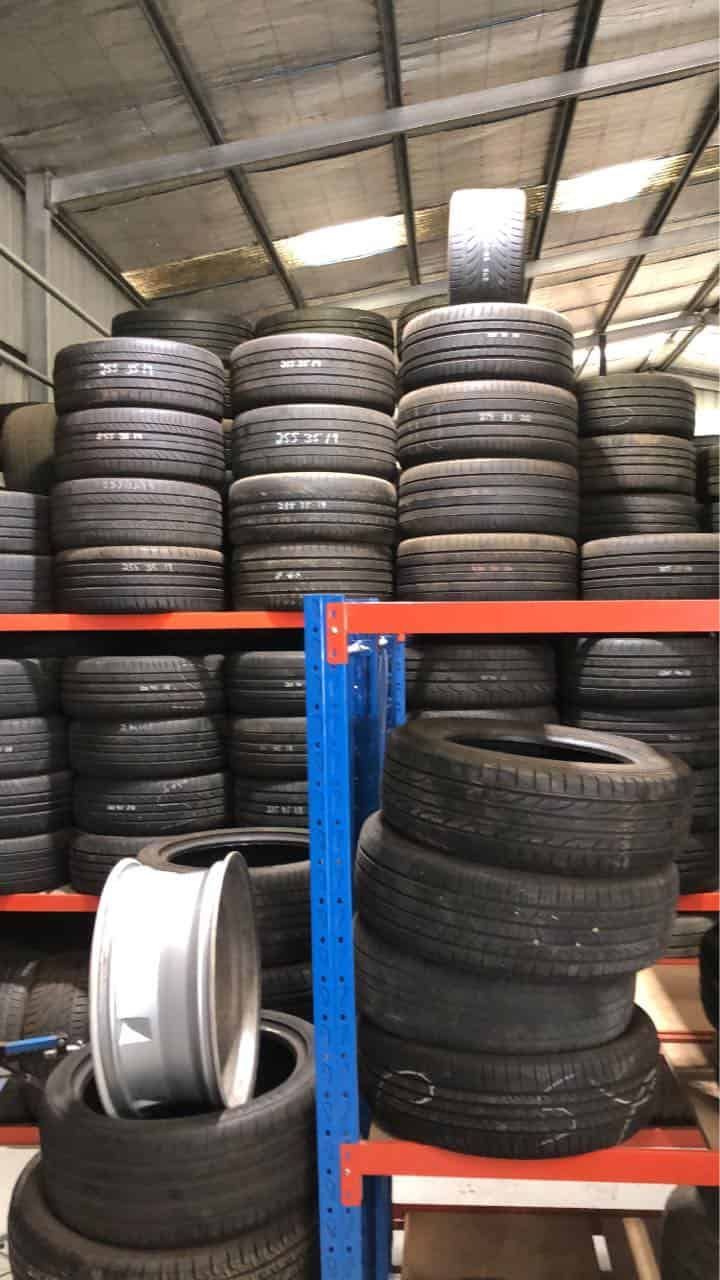 A Warehouse Filled With Lots of Tyres and Wheels — ARB Budget Tyres in Delacombe, VIC
