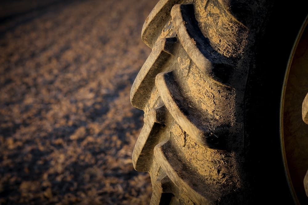 A Close Up of a Tractor Tyre on a Dirt Road — ARB Budget Tyres in Delacombe, VIC