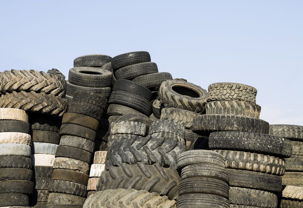 A Pile of Old Tyres Stacked on Top of Each Other — ARB Budget Tyres in Delacombe, VIC
