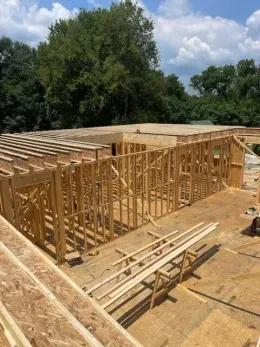 A house is being built with a lot of wood
