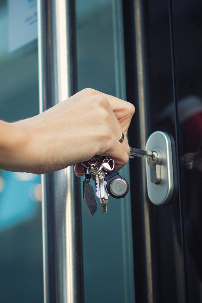 Using Key on Commercial Door — Logan QLD — Aces Locksmiths