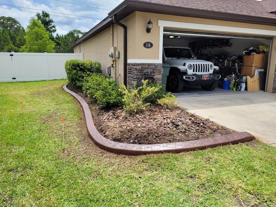 A jeep is parked in the driveway of a house.