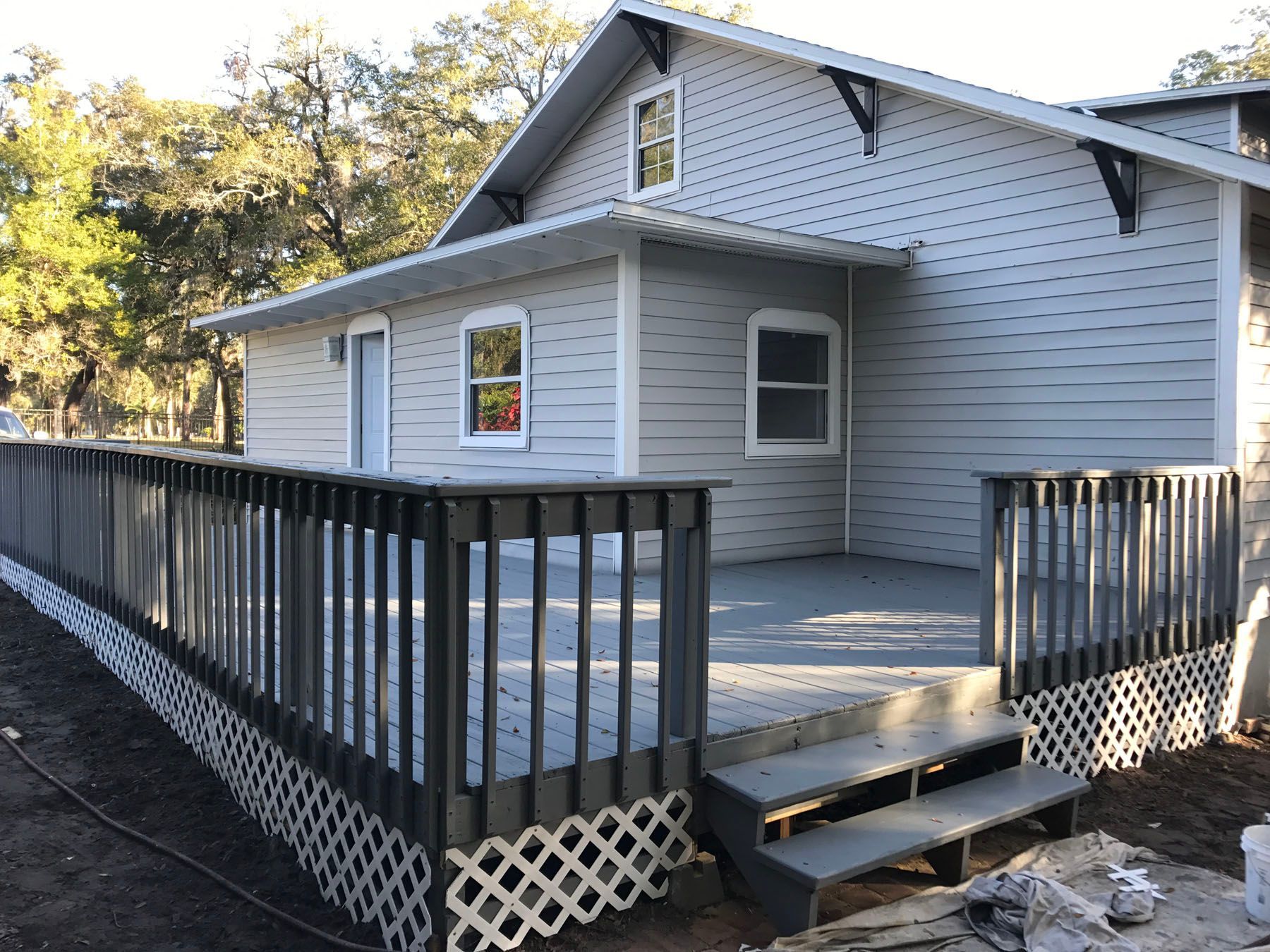 newly renovated house with newly installed deck porch
