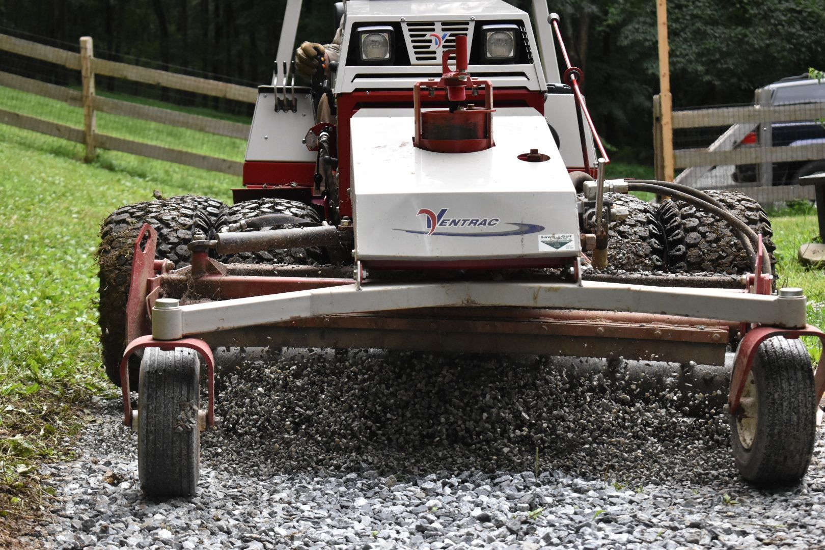 A red and white vehicle with the word vertical on the front