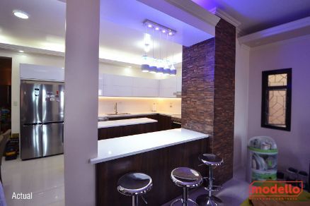 A Kitchen With a Bar and Stools in It — ModulPlus in Hervey Bay, QLD