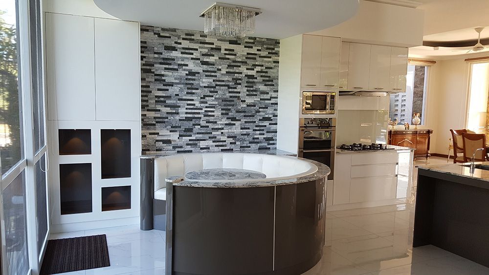 A Kitchen With A Round Island In The Middle Of It — ModulPlus in Hervey Bay, QLD
