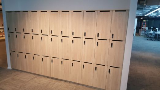 A Row of Wooden Lockers Are Lined Up on a Wall — ModulPlus in Hervey Bay, QLD