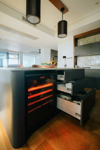 A Kitchen With a Wine Cooler and Drawers Open — ModulPlus in Hervey Bay, QLD