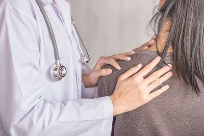 Female Doctor Examining a Patient — Springfield, MO — James River Chiropractic & Wellness