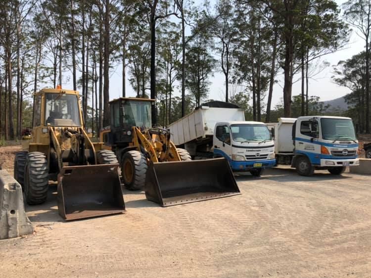 Bulldozer and Trucks Aligned — Garden Supplies Mid North Coast, NSW