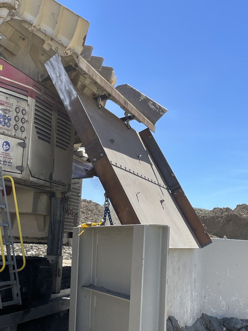 A Rock Crusher With a Chute Depositing Rocks — Lincoln Fabrication in Normanton, QLD