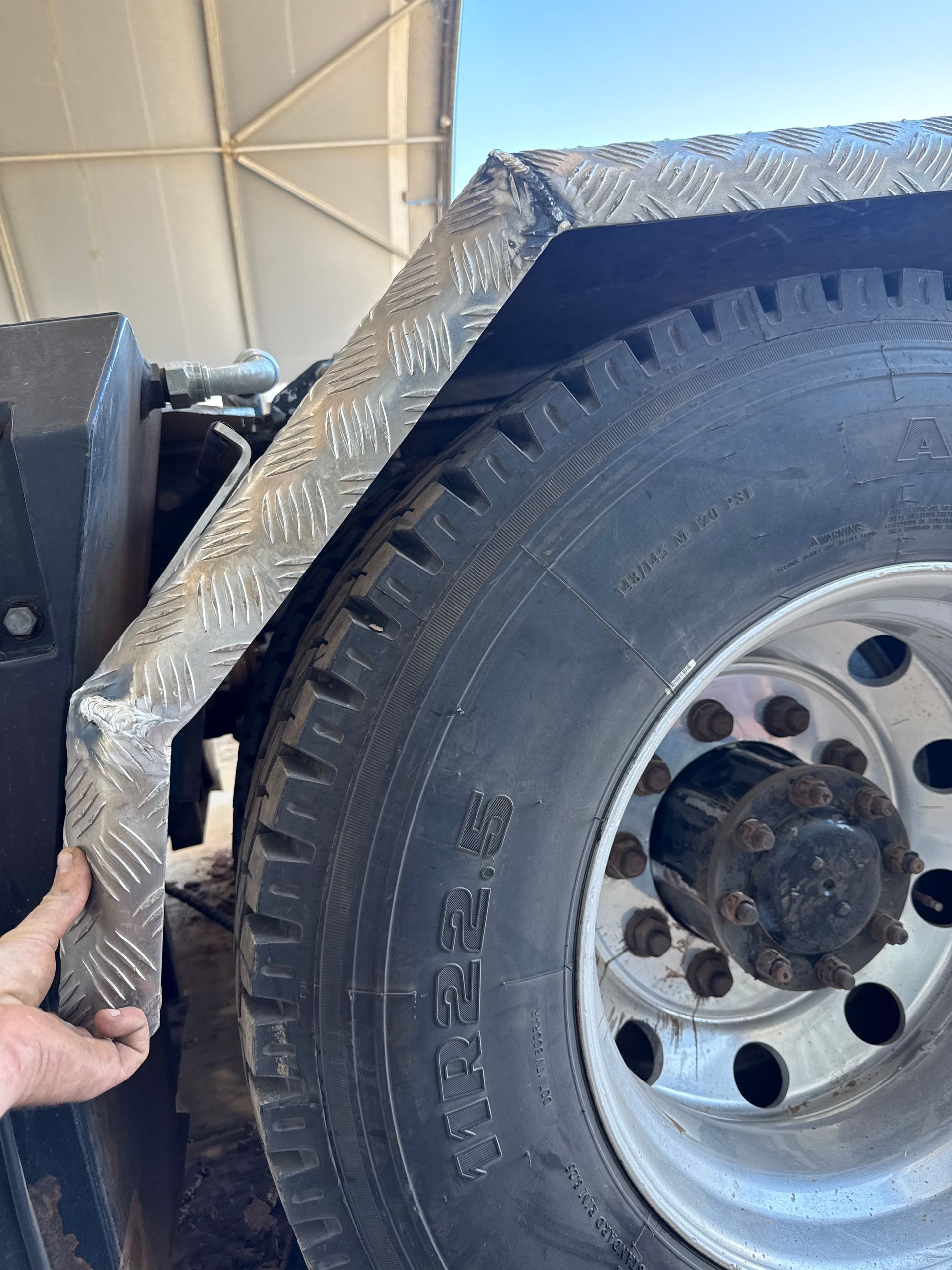 Diamond-plate Fender Over a Truck Tire — Lincoln Fabrication in Miles End, QLD