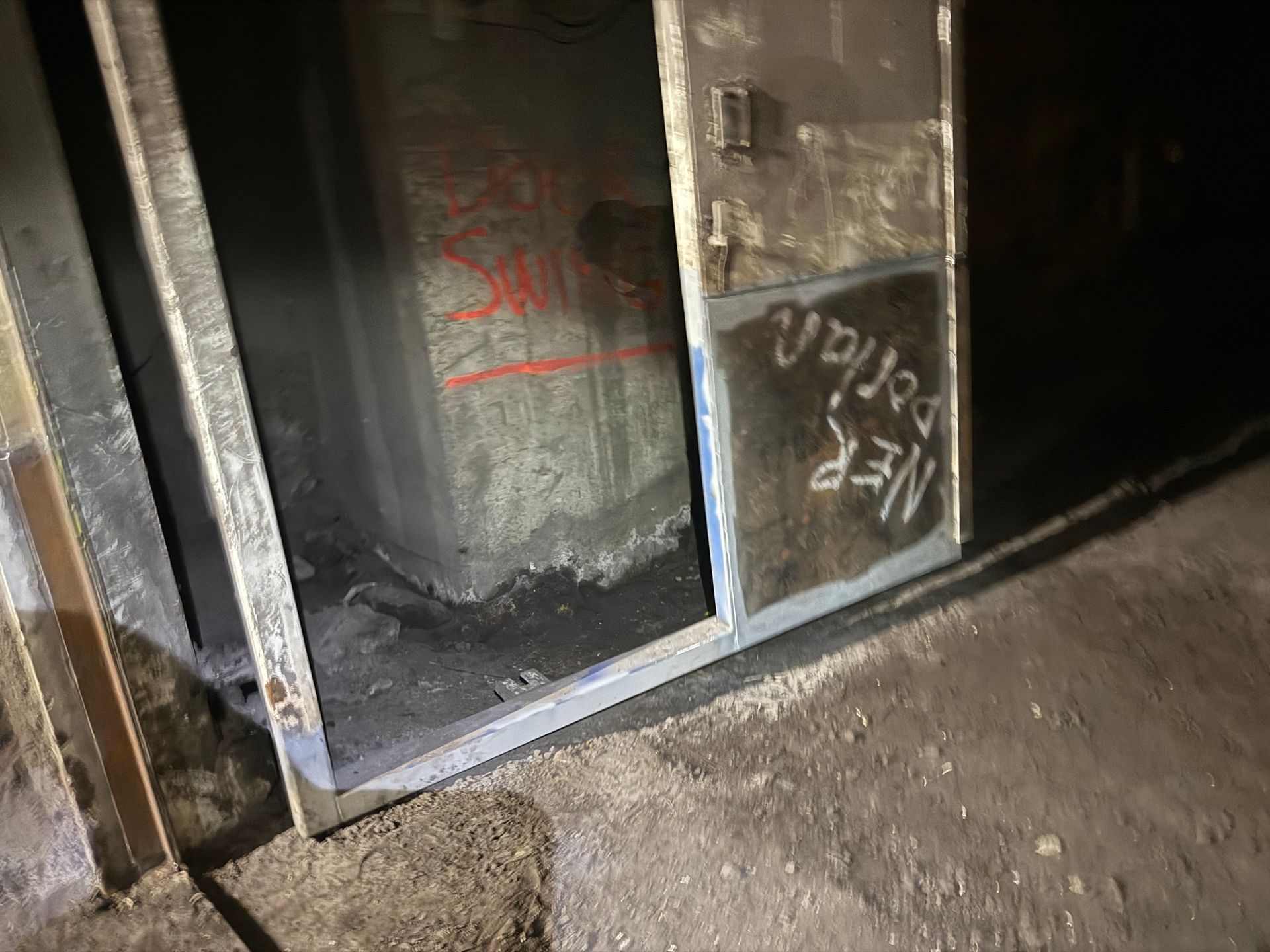 Metal Doorway, Ajar. Dark Room With Concrete Wall — Lincoln Fabrication in Miles End, QLD