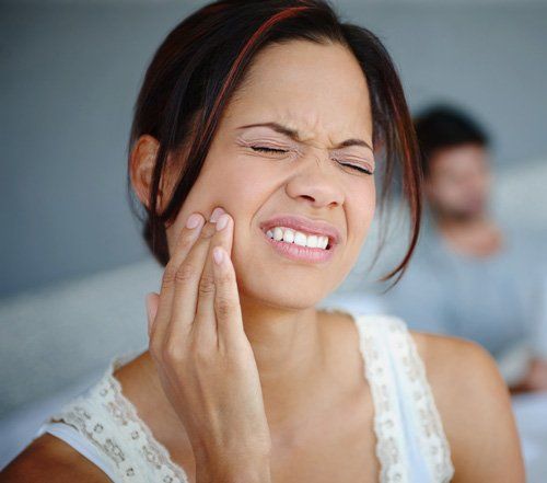 Woman with dental pain