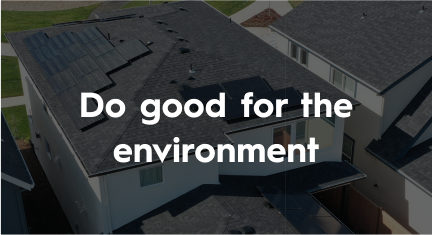 An aerial view of a house with solar panels on the roof.