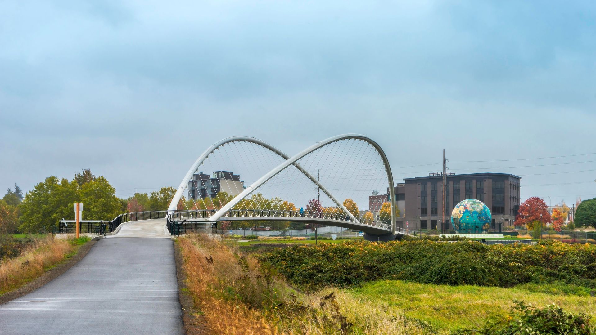 The skyline of New Jersey is reflected in a lake.