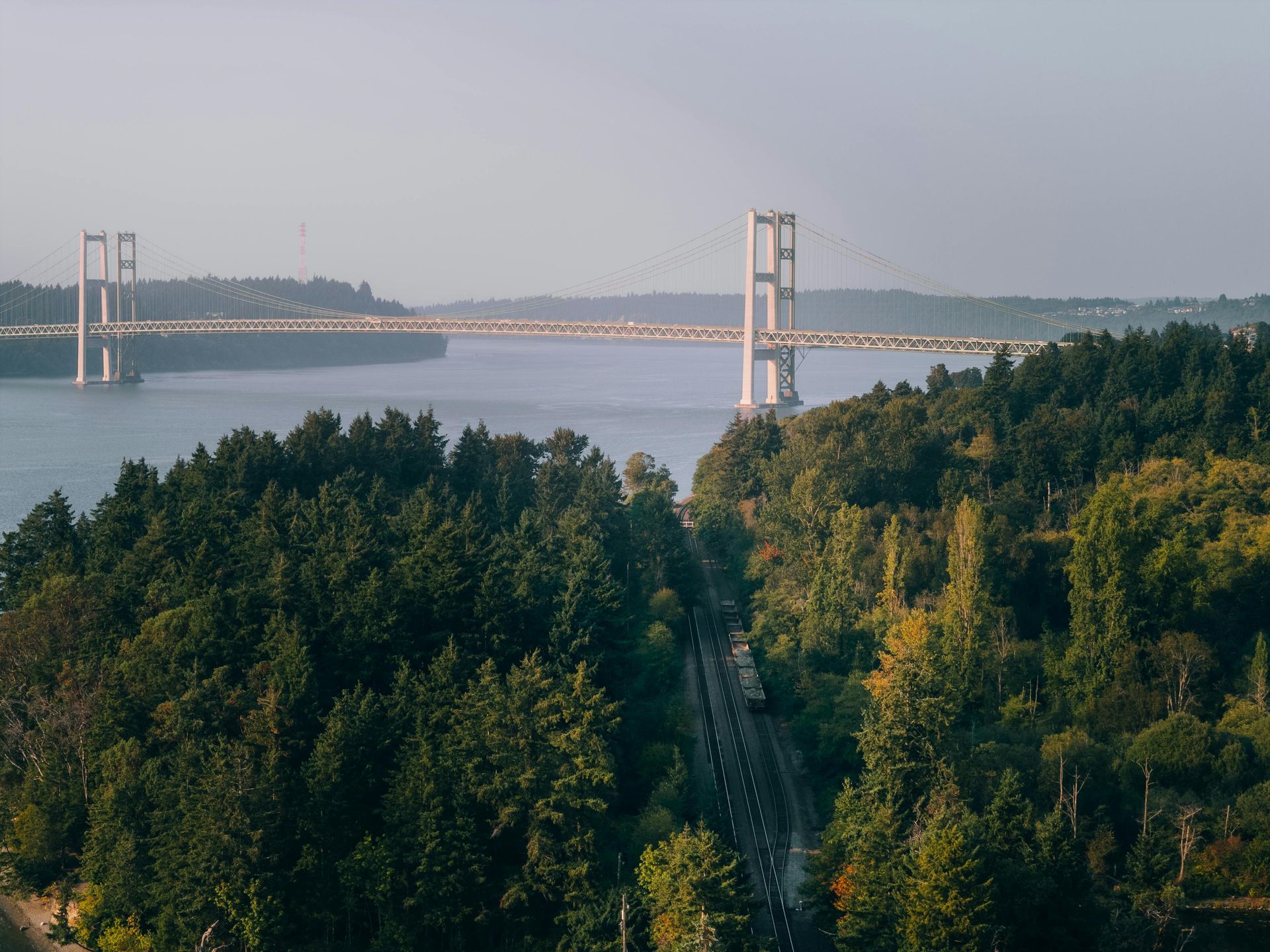 The skyline of New Jersey is reflected in a lake.