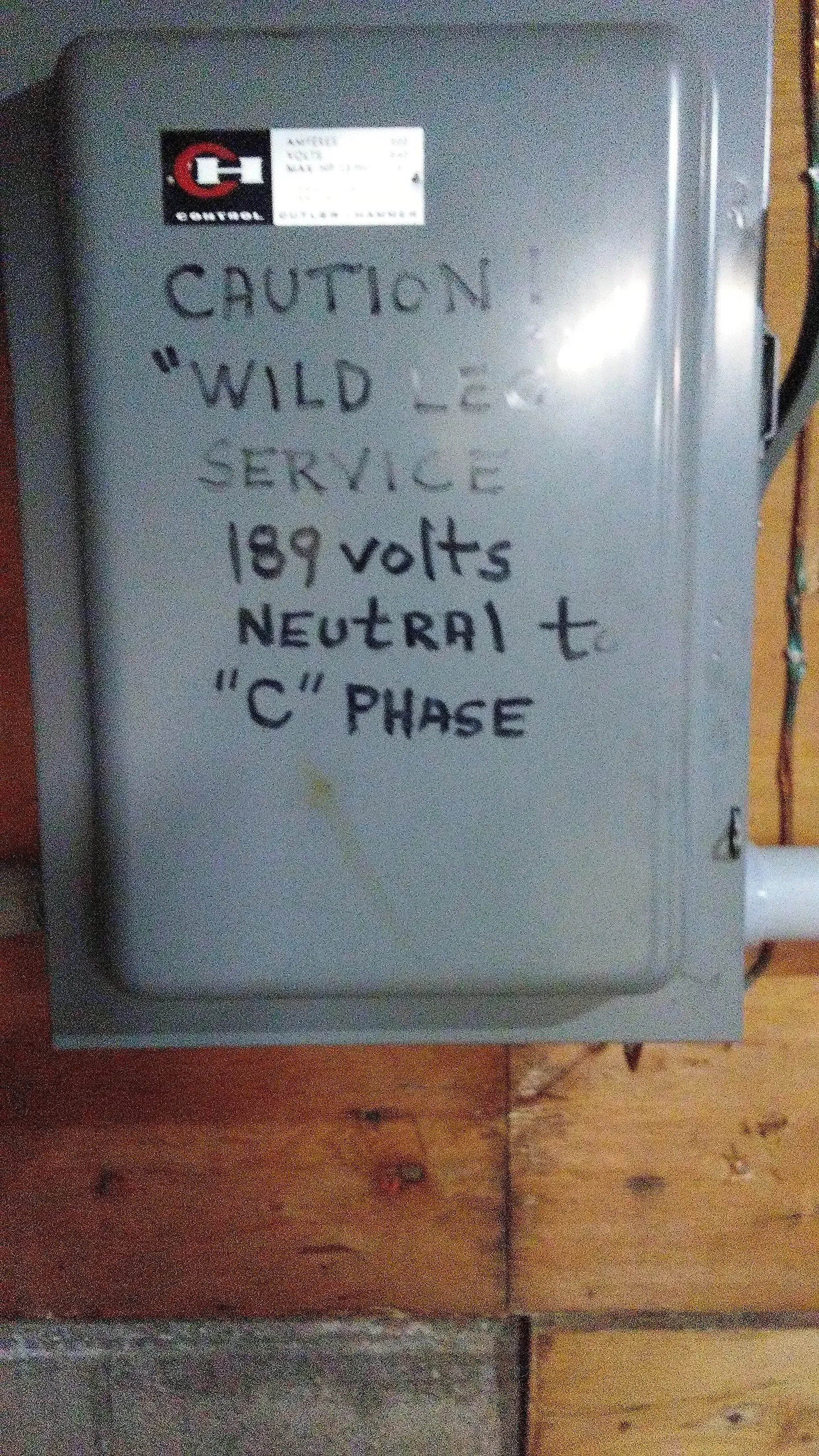 A box with the words `` caution wild service '' written on it.