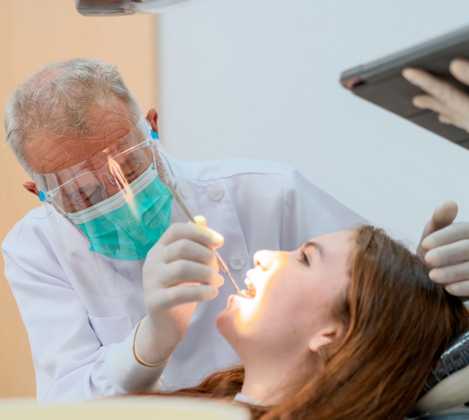 Woman's Teeth Examine By A Dentist — Redding, CA — Lake Boulevard Family Dentistry