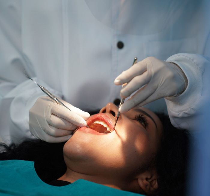 Dentist Checking Patient Teeth — Redding, CA — Lake Boulevard Family Dentistry