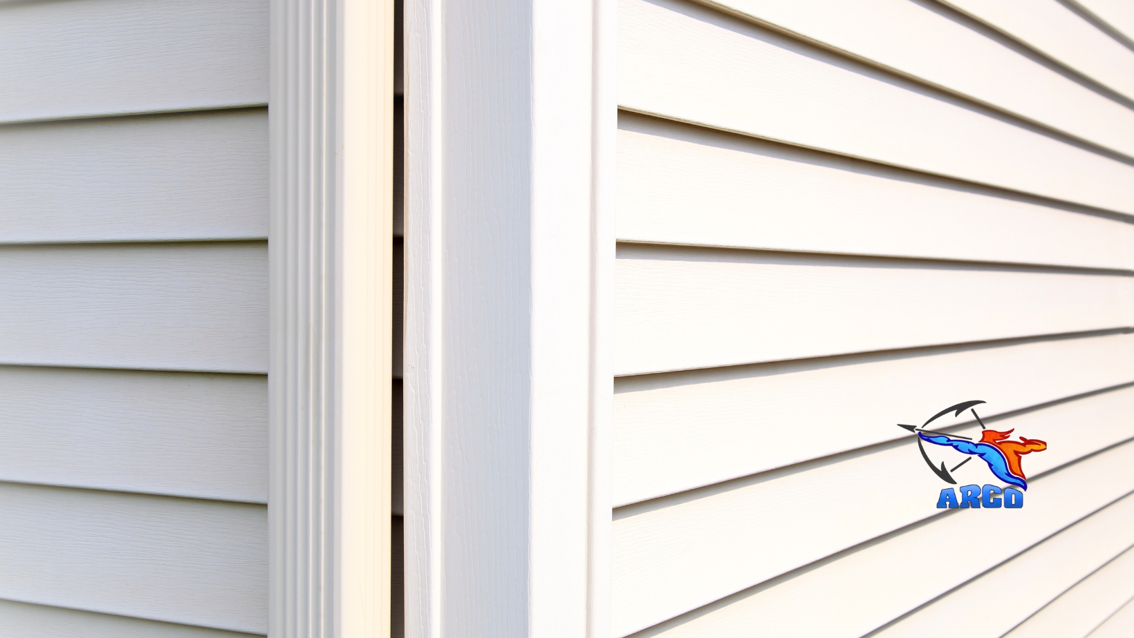 A close up of a white vinyl siding on a mobile home