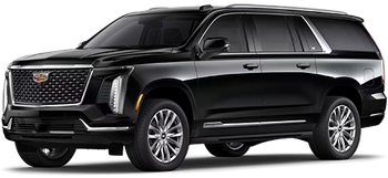 Black GMC Yukon SUV, front view, outdoors.