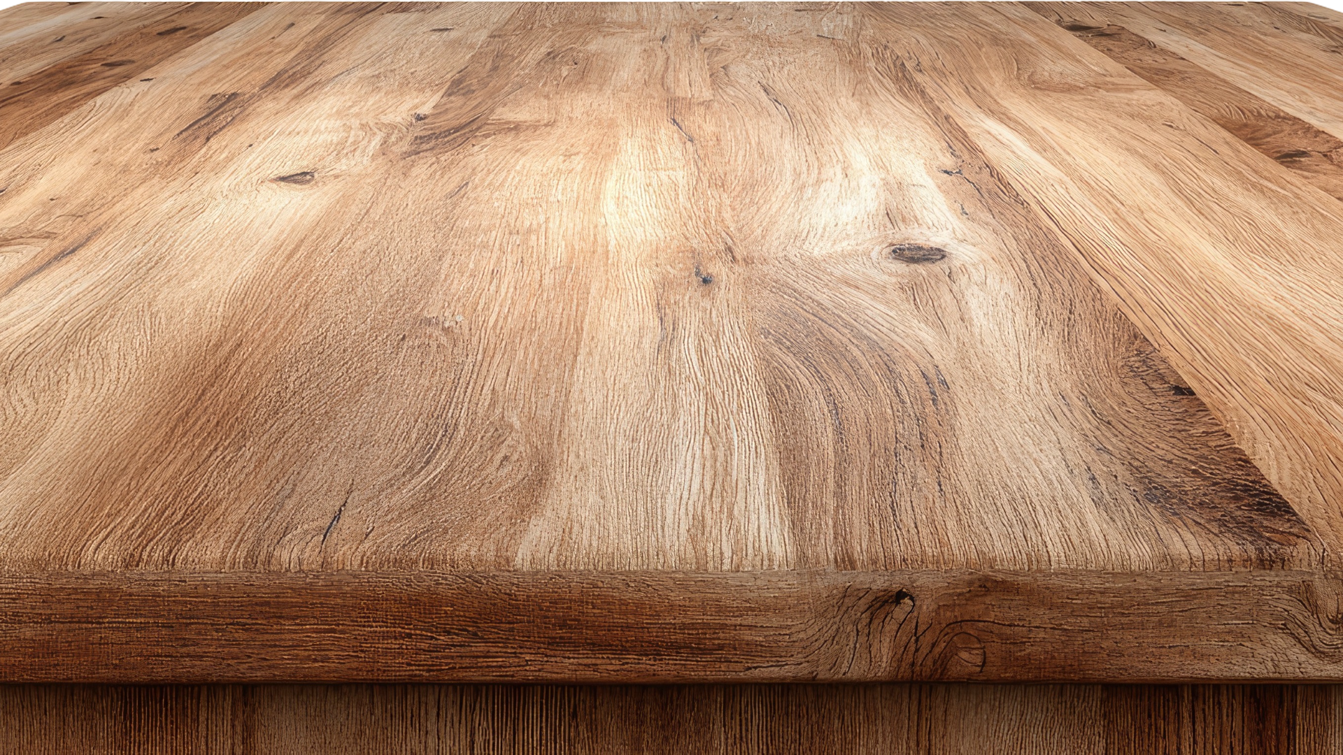A close-up view of a textured, light brown wooden table surface with a natural wood grain pattern.