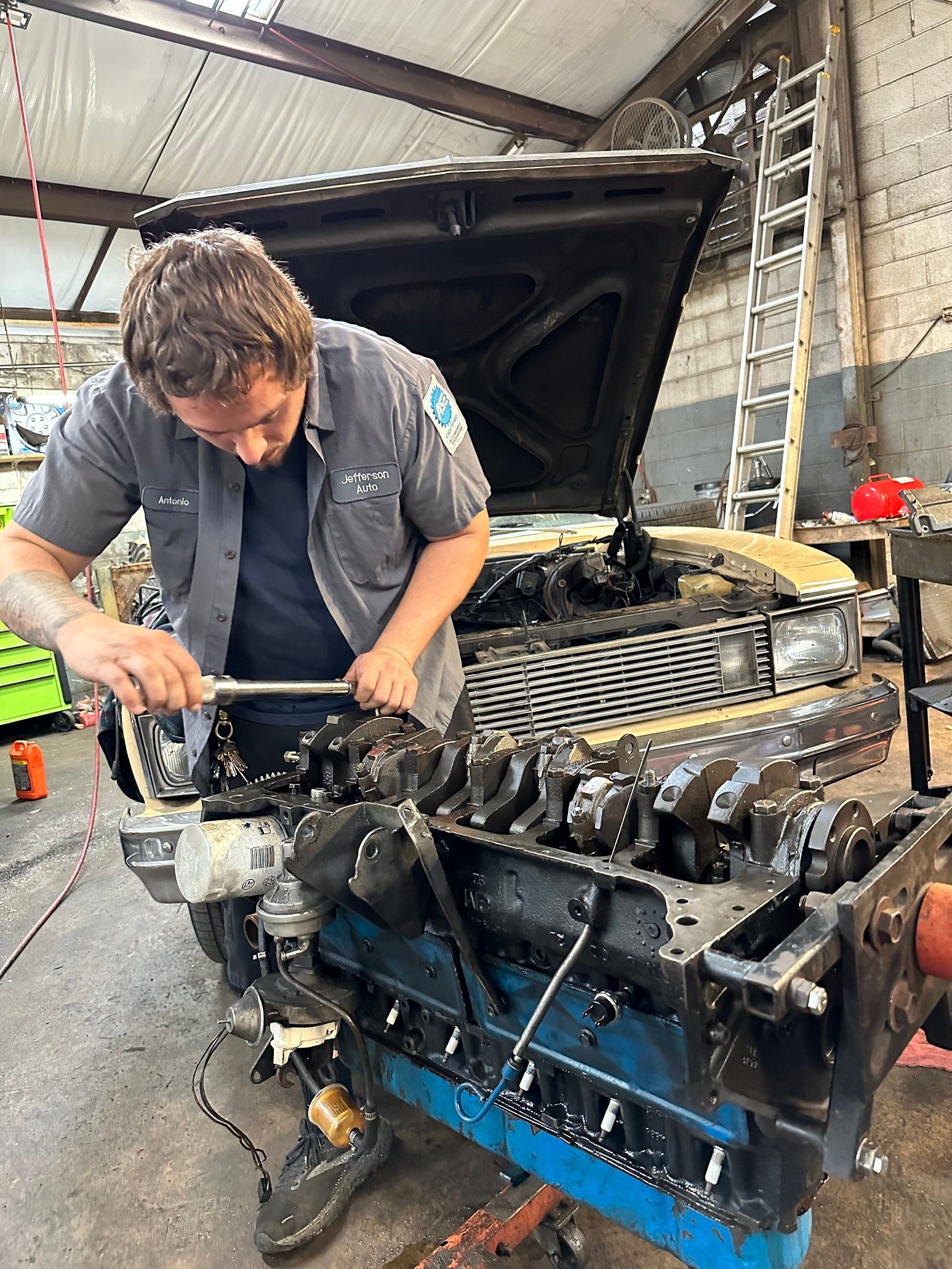 Mechanic Working on a Car Engine | Jefferson Auto Service
