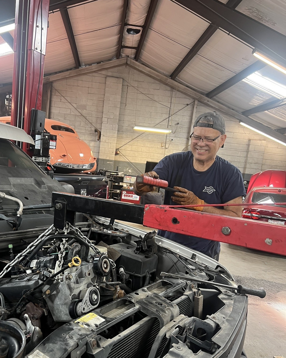 Mechanic Working on a Car Engine | Jefferson Auto Service