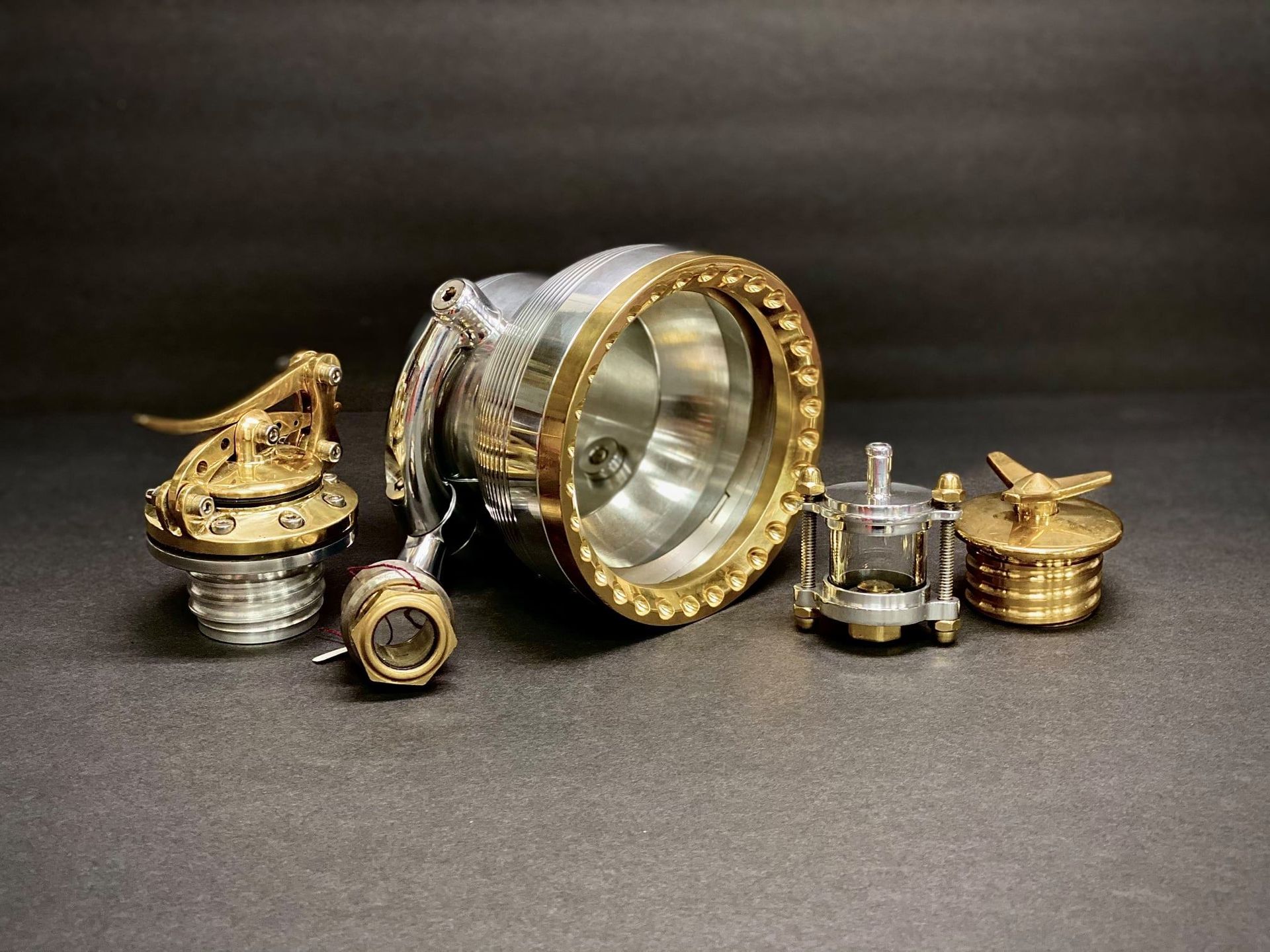 A group of metal objects are sitting on top of each other on a table.