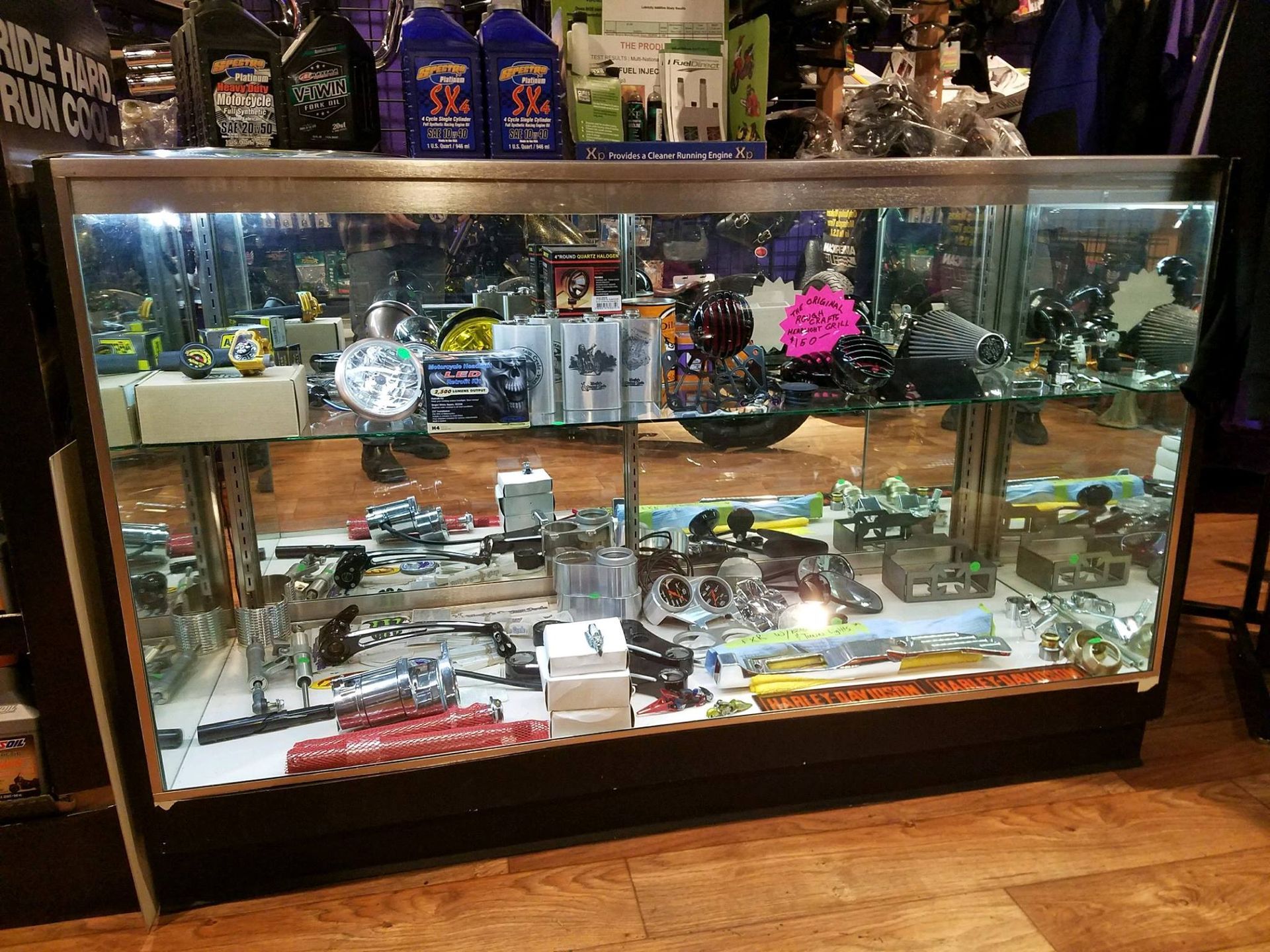 A display case filled with lots of items in a store.