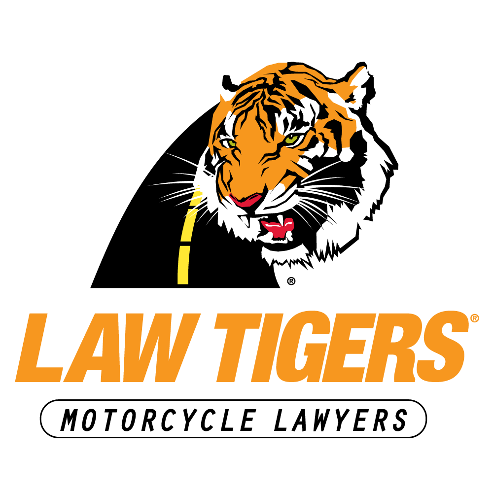 Law Tigers logo with tiger head, road, and text 