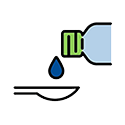 A light blue bottle with a green cap pouring a dark blue drop of liquid onto a white spoon.