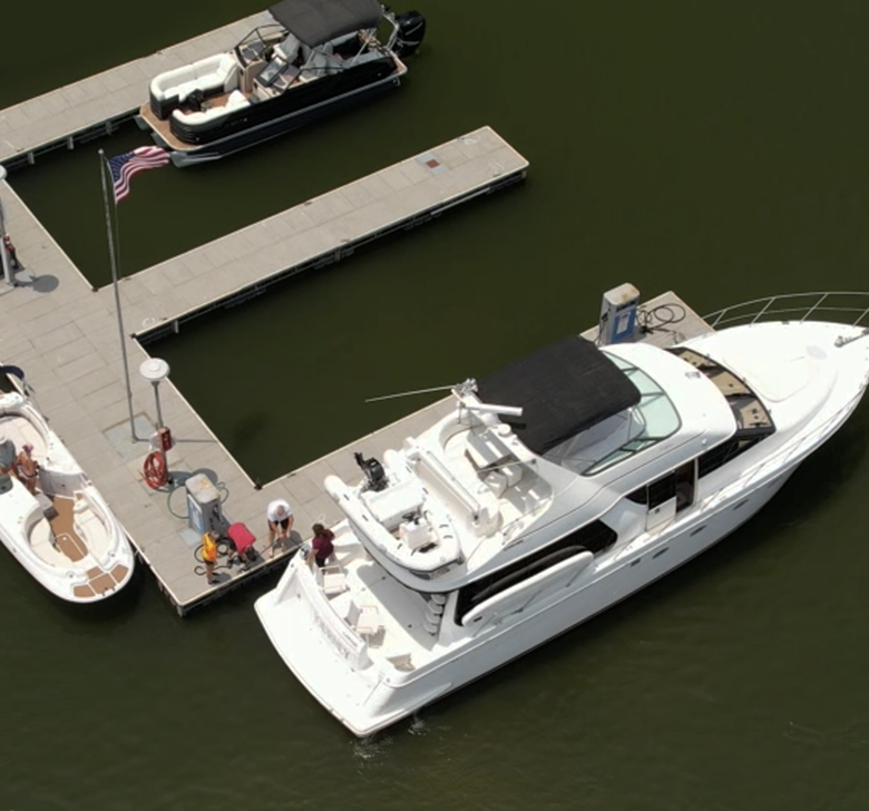 An aerial view of boats docked at a dock