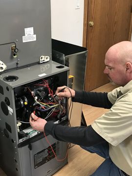 Duct Cleaning — Repairman Smiles Doing HVAC in White Lake, MI