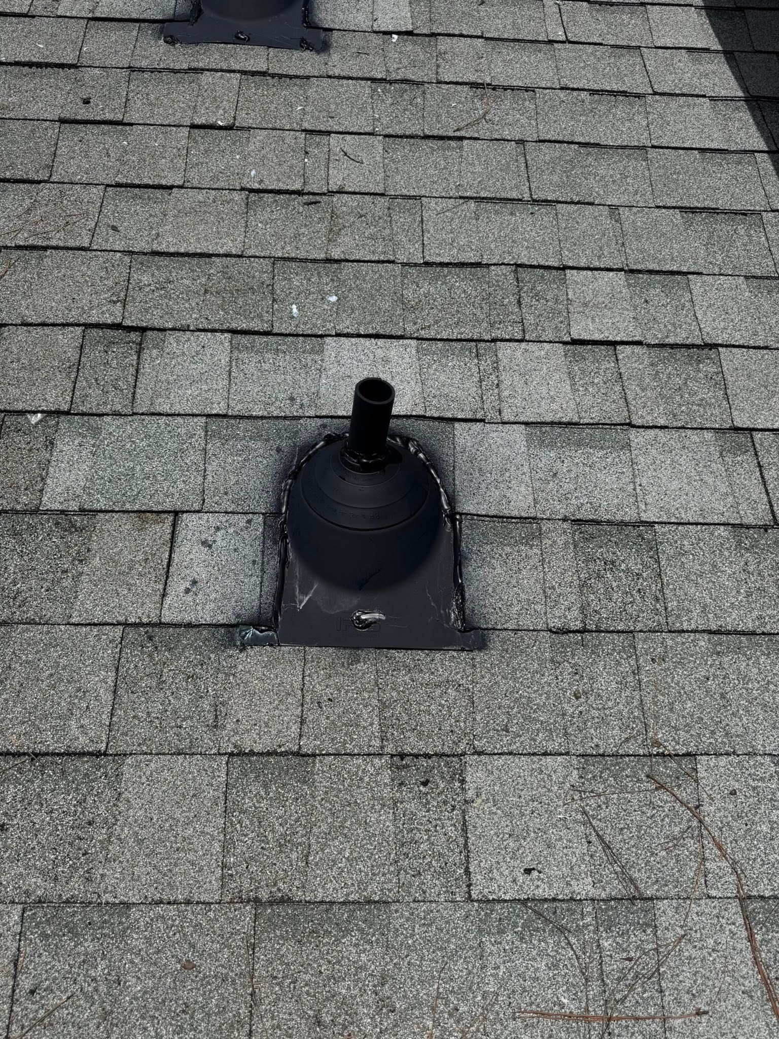 A close up of a roof with a hole in it.