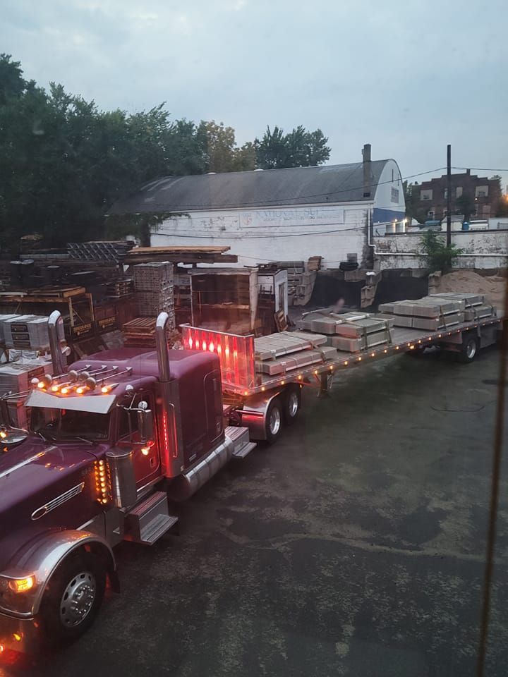 Worker Installing Limestone — Roselle, NJ — Twin Boro Lumber & Supply Center